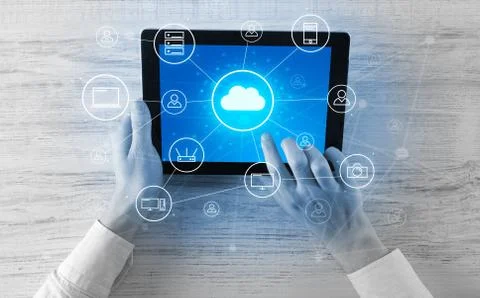 Hand using tablet with centralized cloud computing system concept 스톡 사진
