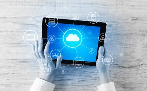 Hand using tablet with centralized cloud computing system concept 스톡 사진