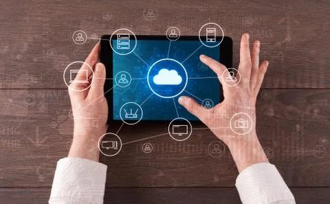 Hand using tablet with centralized cloud computing system concept 스톡 사진