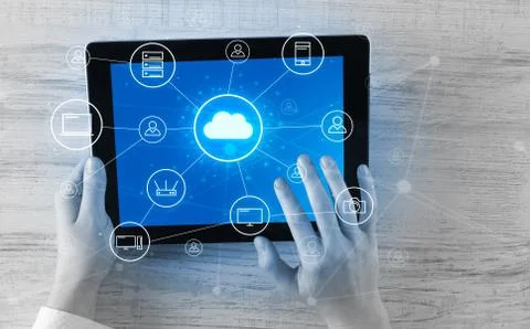 Hand using tablet with centralized cloud computing system concept 스톡 사진