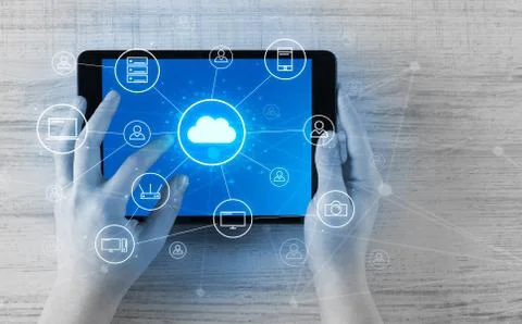 Hand using tablet with centralized cloud computing system concept 스톡 사진