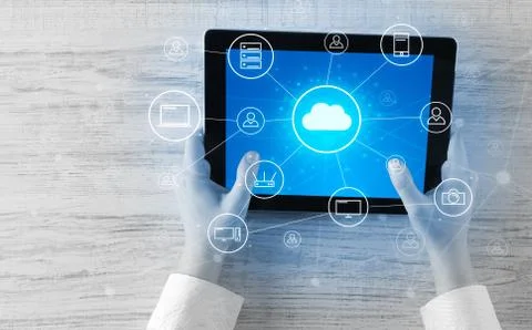 Hand using tablet with centralized cloud computing system concept 스톡 사진