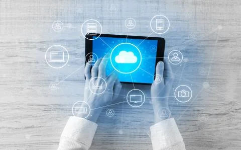 Hand using tablet with centralized cloud computing system concept 스톡 사진
