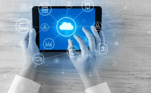 Hand using tablet with centralized cloud computing system concept 스톡 사진