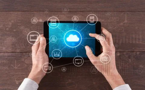 Hand using tablet with centralized cloud computing system concept 스톡 사진