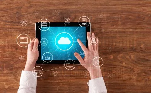 Hand using tablet with centralized cloud computing system concept 스톡 사진