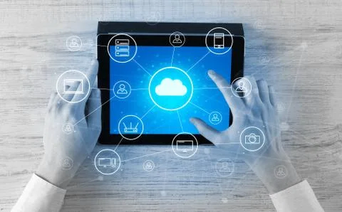 Hand using tablet with centralized cloud computing system concept 스톡 사진