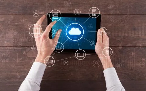 Hand using tablet with centralized cloud computing system concept 스톡 사진