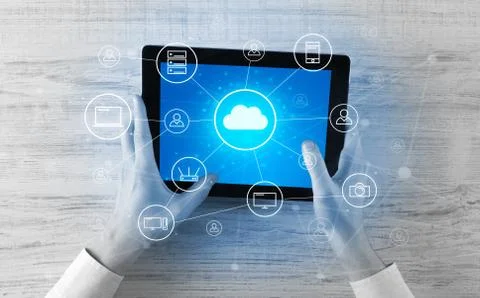 Hand using tablet with centralized cloud computing system concept 스톡 사진