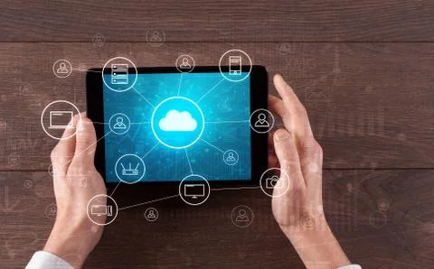 Hand using tablet with centralized cloud computing system concept 스톡 사진
