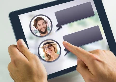 Hand using tablet with chat bubble messaging profile Foto stock
