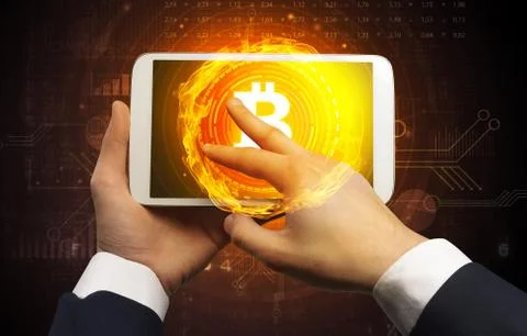 Hand using tablet with cryptocurrency concept Foto stock