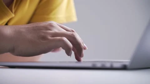 Hand using the touchpad Stock Footage 141911617