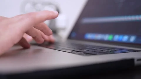 Hand Using Trackpad On MacBook Laptop Stock Footage 336604537