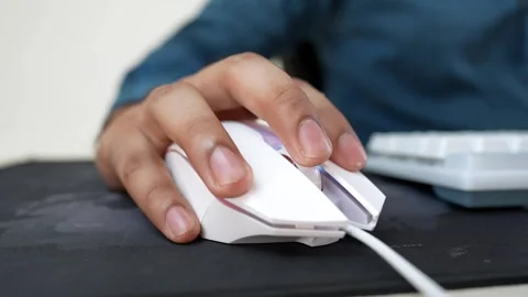 Hand Using White Computer Mouse on Black Mousepad Stock Footage 320725885