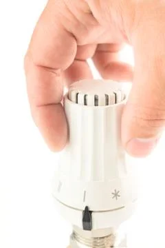 Hand on a valve Stock Photos