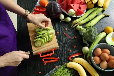 Hand with vegetable, hand holding food Stock Photos