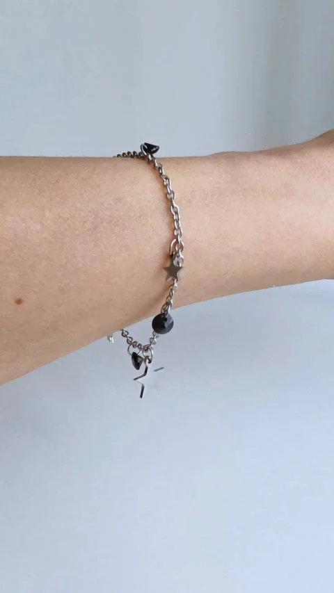 Hand view of lady with bracelet. Close-up of a woman hand with bracelet. Video stock 310954907