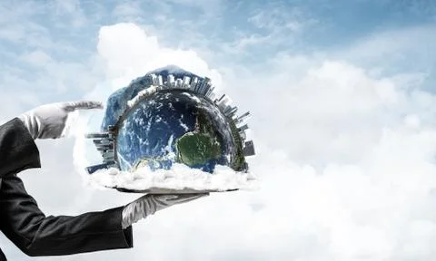 Hand of waitress presenting Earth globe on tray. Stock Photos