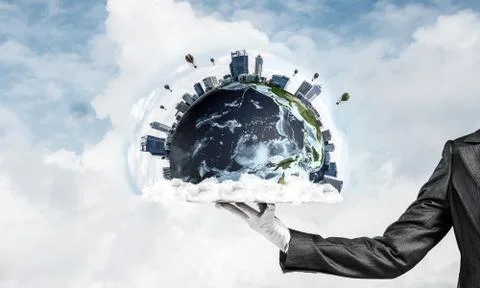 Hand of waitress presenting Earth globe on tray. Stock Photos