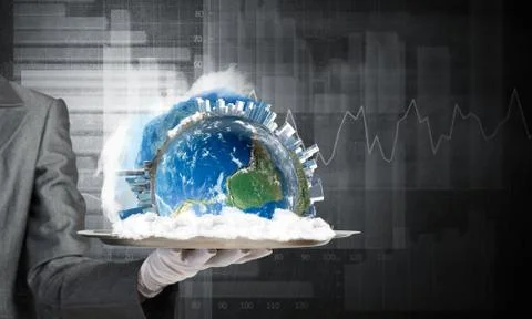 Hand of waitress presenting Earth globe on tray. Stock Photos