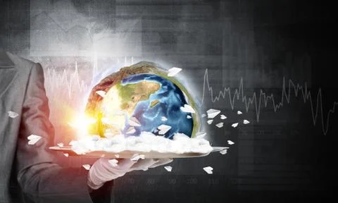 Hand of waitress presenting Earth globe on tray. Stock Photos