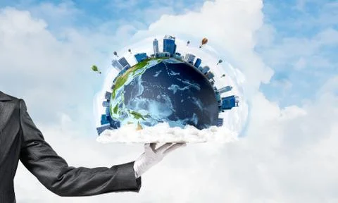 Hand of waitress presenting Earth globe on tray. Stock Photos
