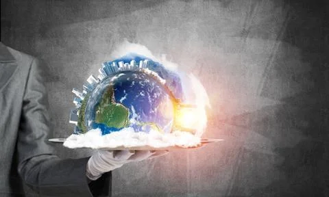 Hand of waitress presenting Earth globe on tray. Stock Photos