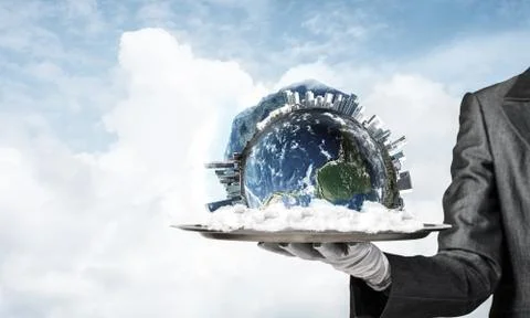 Hand of waitress presenting Earth globe on tray. Stock Photos