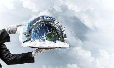 Hand of waitress presenting Earth globe on tray. Stock Photos