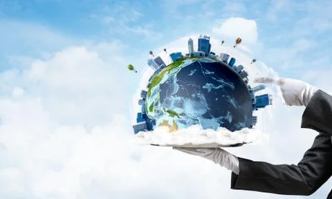 Hand of waitress presenting Earth globe on tray. Stock Photos