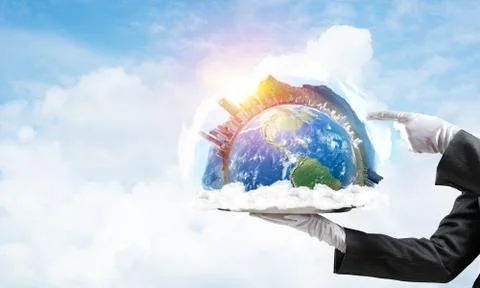 Hand of waitress presenting Earth globe on tray. Stock Photos