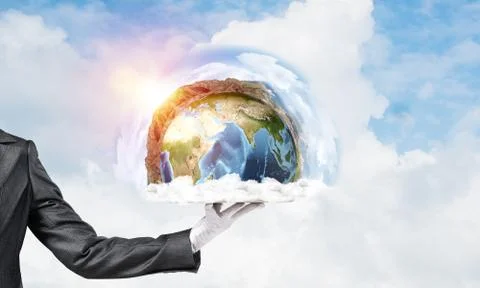 Hand of waitress presenting Earth globe on tray. Stock Photos