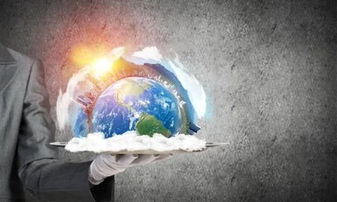 Hand of waitress presenting Earth globe on tray. Stock Photos