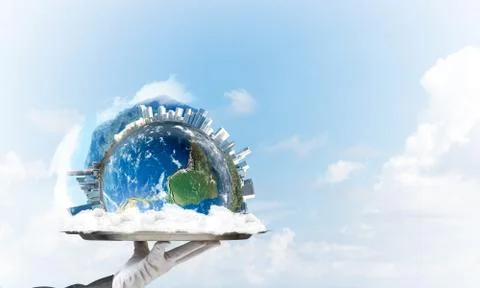 Hand of waitress presenting Earth globe on tray. Stock Photos