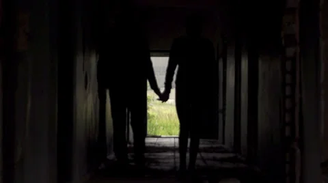 Hand walking down a dark hallway Video stock 39844669
