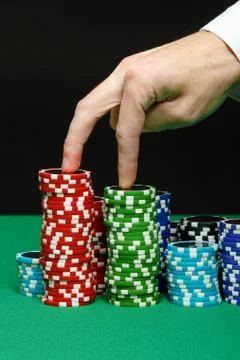 Hand walks on a chips Stock Photos
