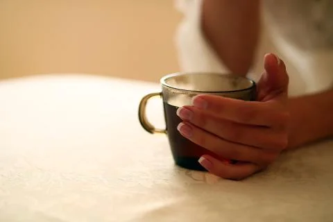 Hand warm tea Stock Photos