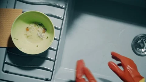 Hand wash dirty dishes with food waste Stock Footage