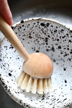  hand washes dishes Stock Photos