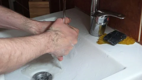 Hand washing close-up, slow motion. Clean hands protect against infection. Stock Footage 126753863