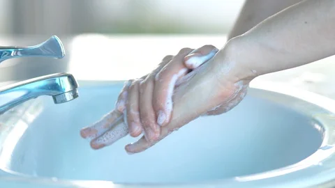 Hand washing with highgiene soap to prevent coronavirus covid19. Stock Footage 129570159