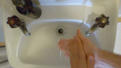 Hand washing sequence for 1 minute, 4K Stock Footage 138733048