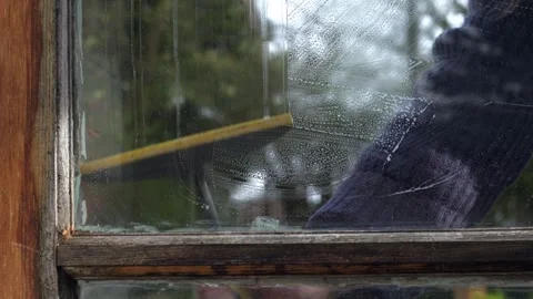 Hand washing window with soapy water Stock Footage 271568630