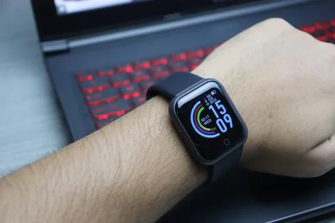 Hand with a watch Stock Photos