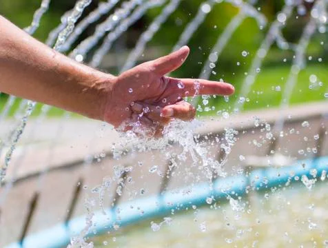 Hand on water splash background Foto stock