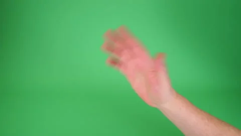 Hand wave on Green screen Chromakey pt 1 of 3 Stock Footage 194787064