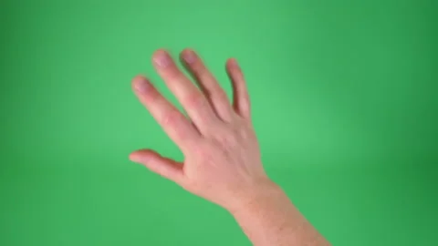 Hand wave on Green screen Chromakey pt 2 of 3 Stock Footage 194787280