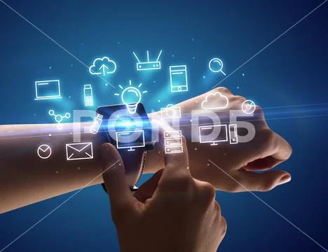Hand wearing smartwatch with multimedia symbols Stock Photos