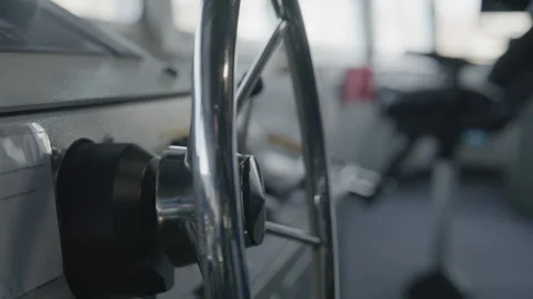 Hand on the wheel steering a big ship Stock Footage 331344537